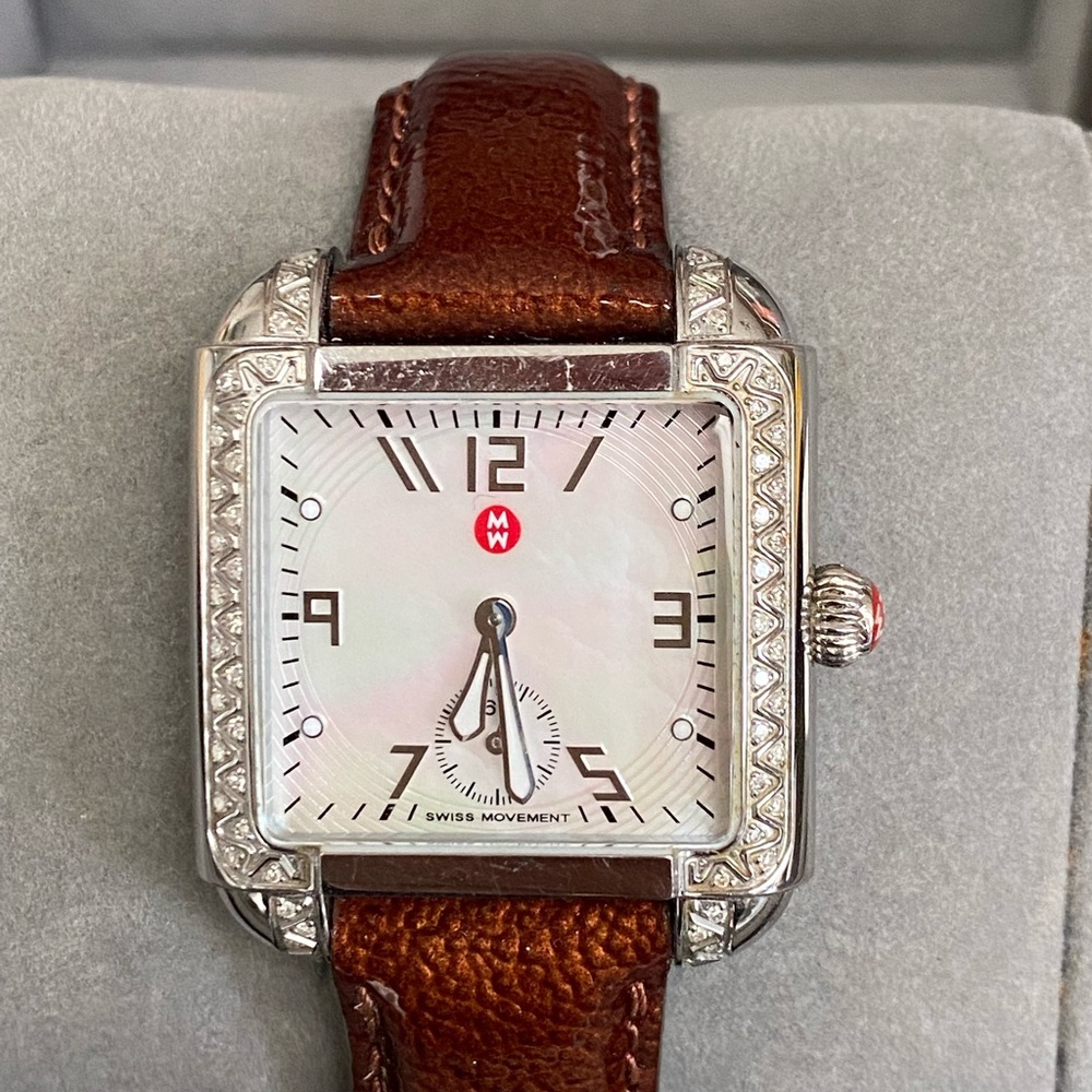 Mother of Pearl, diamonds & burgundy leather band.